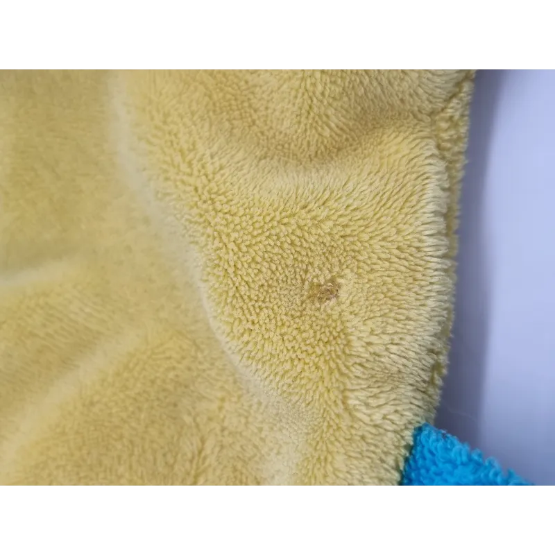 DOUDOU ET COMPAGNIE marionnette super héros garçon bleu vert cape