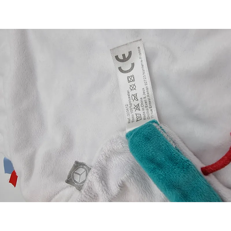 Oxybul doudou plat carré blanc à étiquettes